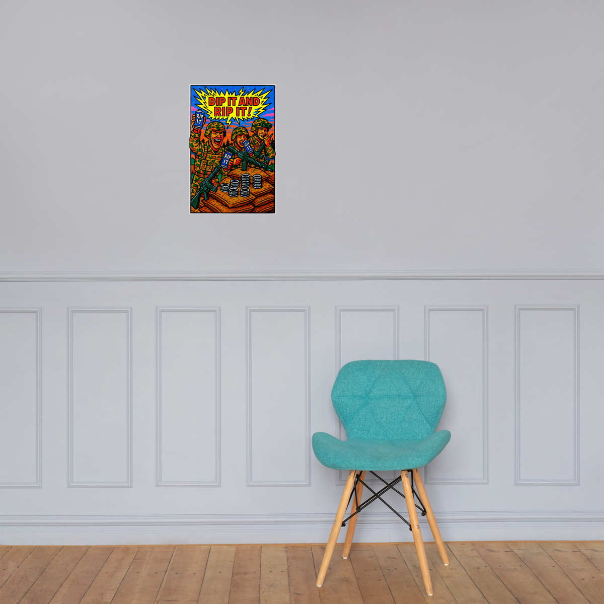 Dip It and Rip It!: 12 in by 18 in glossy poster on a paneled wall above a turquoise chair; Printful room mockup.