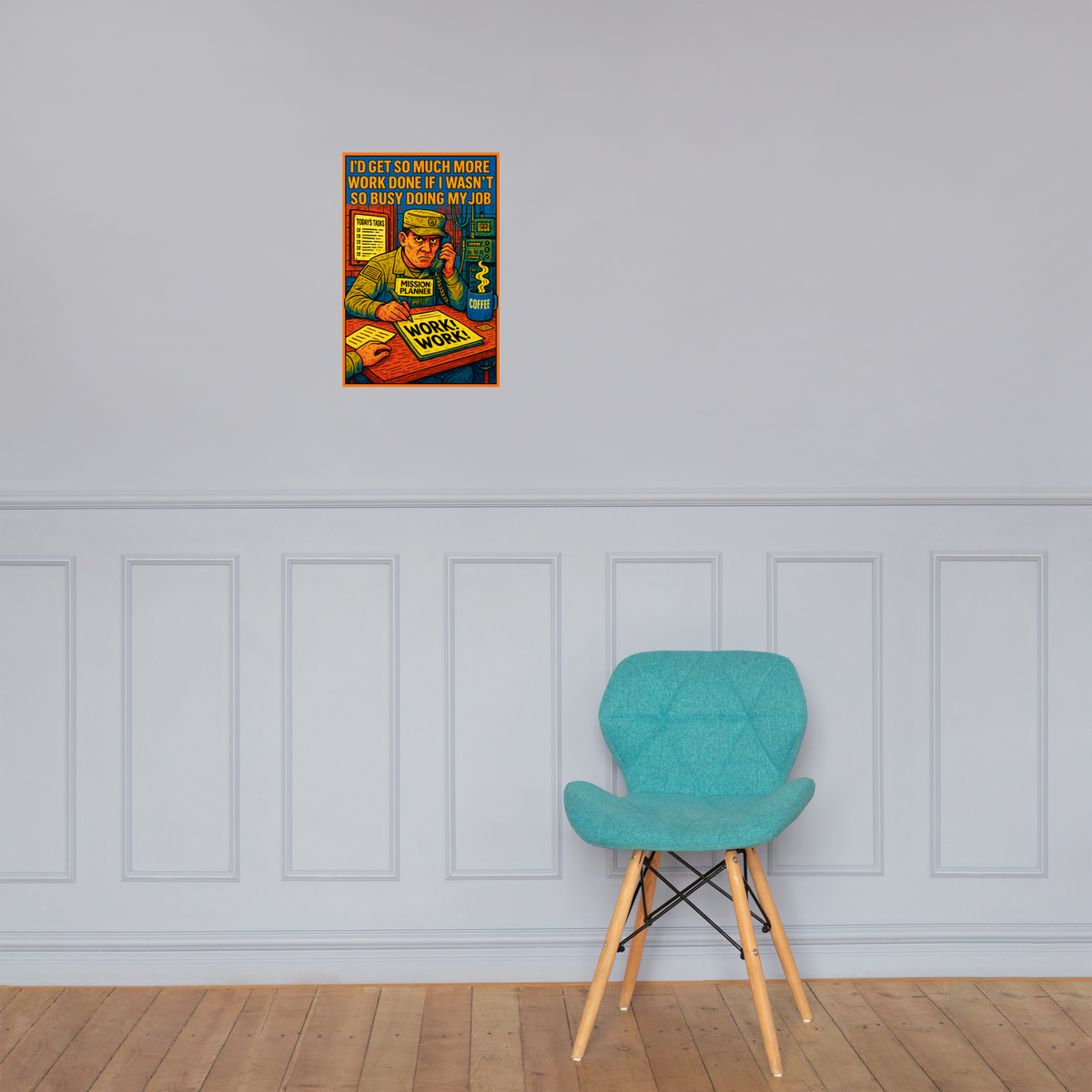 I'd Get So Much More Work Done If I Wasn't So Busy Doing My Job: 12 in by 18 in glossy poster on a paneled wall above a turquoise chair; Printful room mockup.