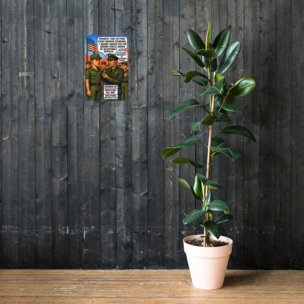 For Hitting Every Minimum Standard: 12 in by 18 in glossy poster on a dark wooden wall beside a plant; Printful room mockup.