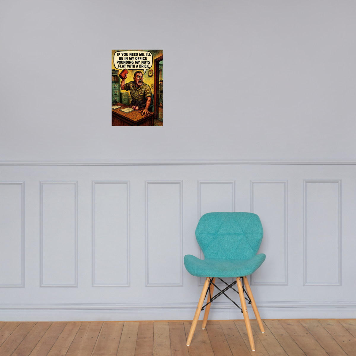If You Need Me, I’ll Be in My Office Pounding My Nuts Flat with a Brick: 12 in by 18 in glossy poster on a paneled wall above a turquoise chair; Printful room mockup.