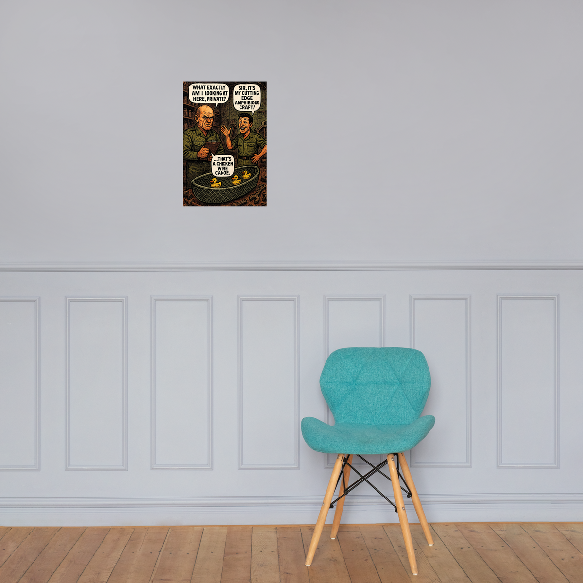 What Exactly Am I Looking at Here, Private?: 12 in by 18 in glossy poster on a paneled wall above a turquoise chair; Printful room mockup.