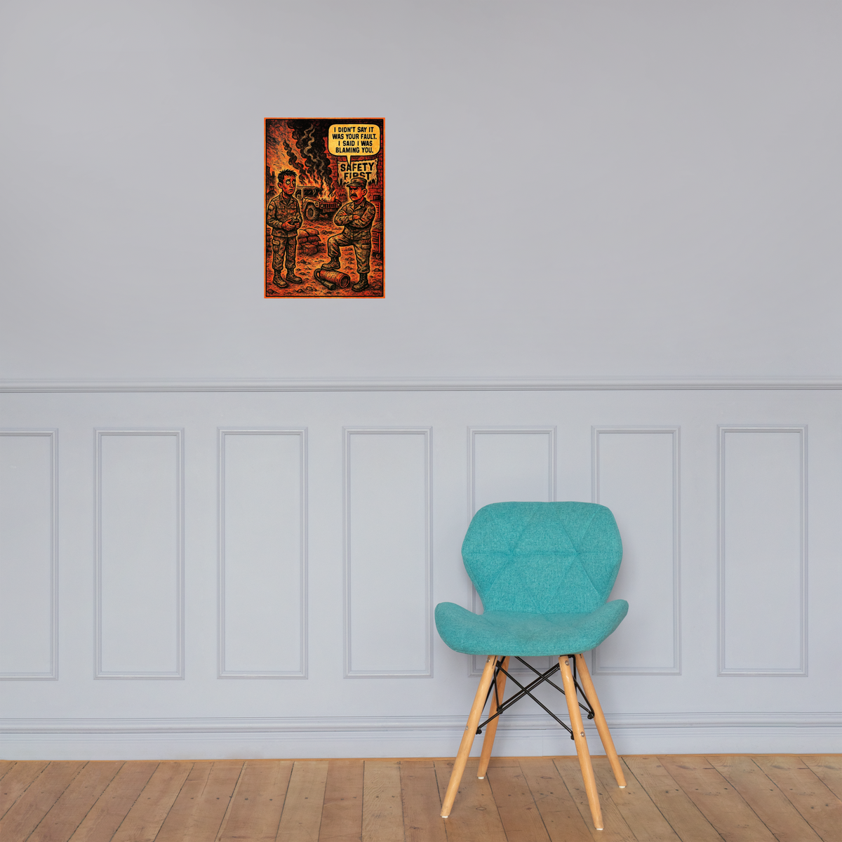 I Didn't Say It Was Your Fault: 12 in by 18 in glossy poster on a paneled wall above a turquoise chair; Printful room mockup.