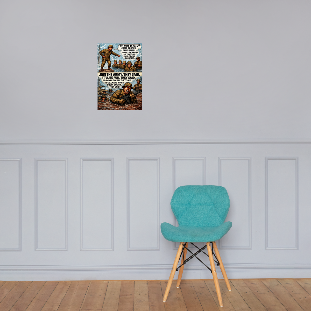 Welcome to Balmy Camp Rudder, Gentlemen: 12 in by 18 in glossy poster on a paneled wall above a turquoise chair; Printful room mockup.