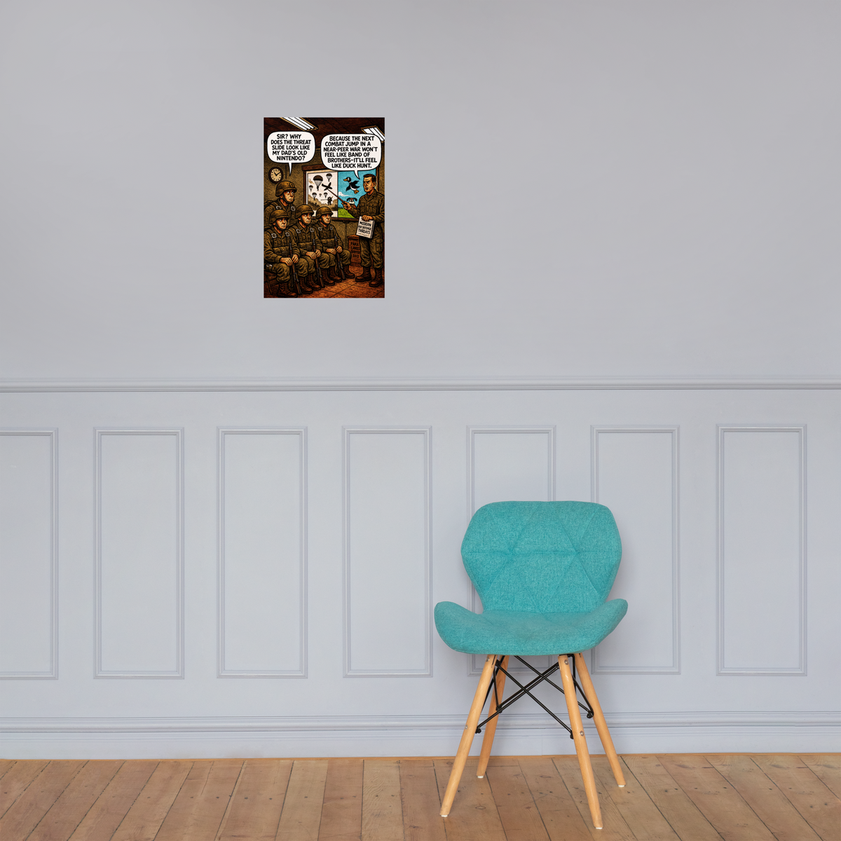 Why Does the Threat Slide Look Like My Dad's Old Nintendo?: 12 in by 18 in glossy poster on a paneled wall above a turquoise chair; Printful room mockup.