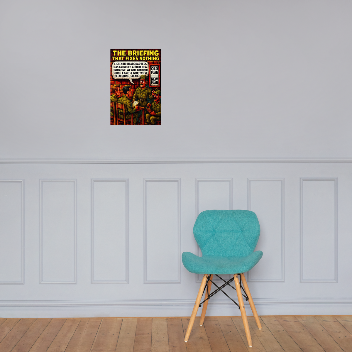 The Briefing That Fixes Nothing: 12 in by 18 in glossy poster on a paneled wall above a turquoise chair; Printful room mockup.