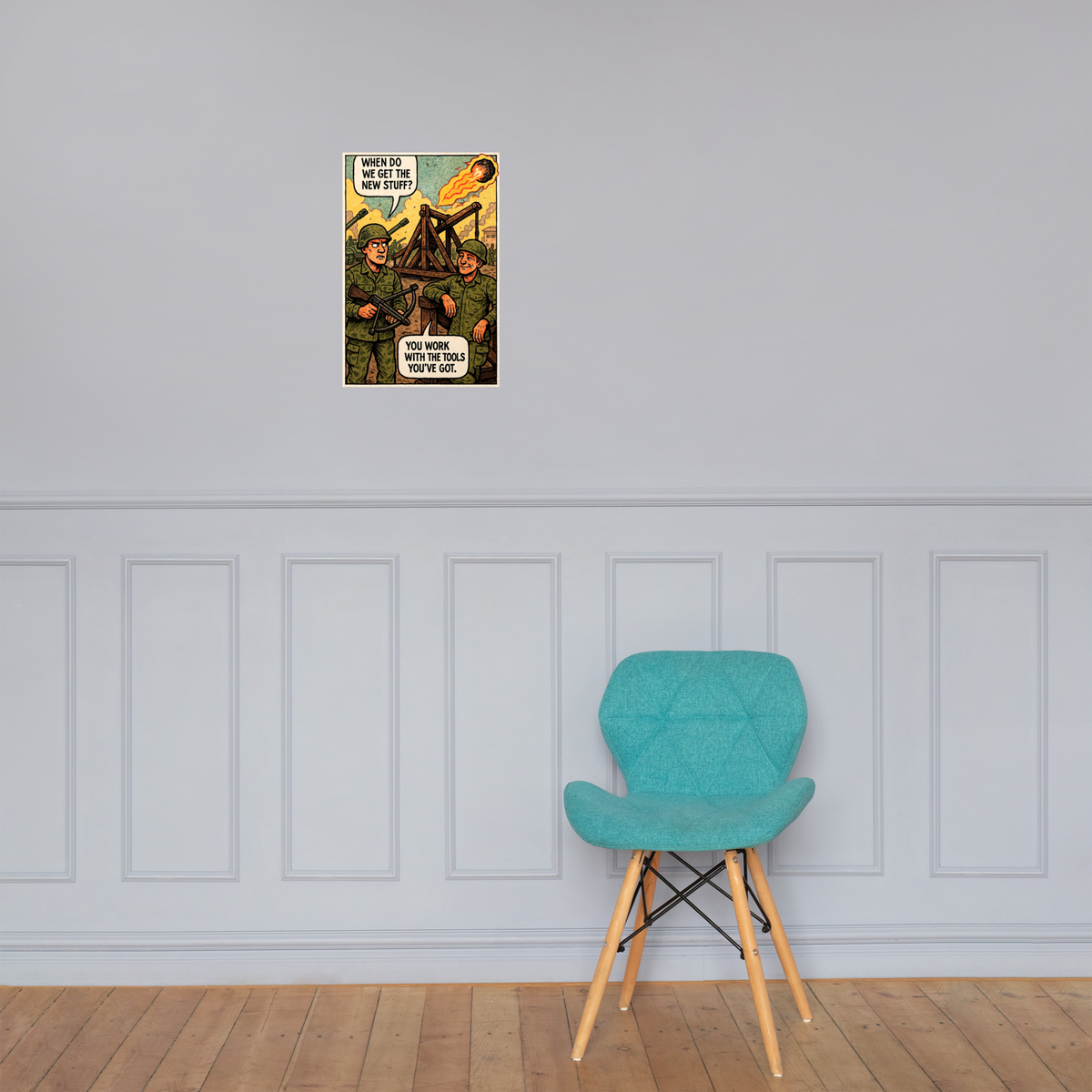 When Do We Get the New Stuff?: 12 in by 18 in glossy poster on a paneled wall above a turquoise chair; Printful room mockup.