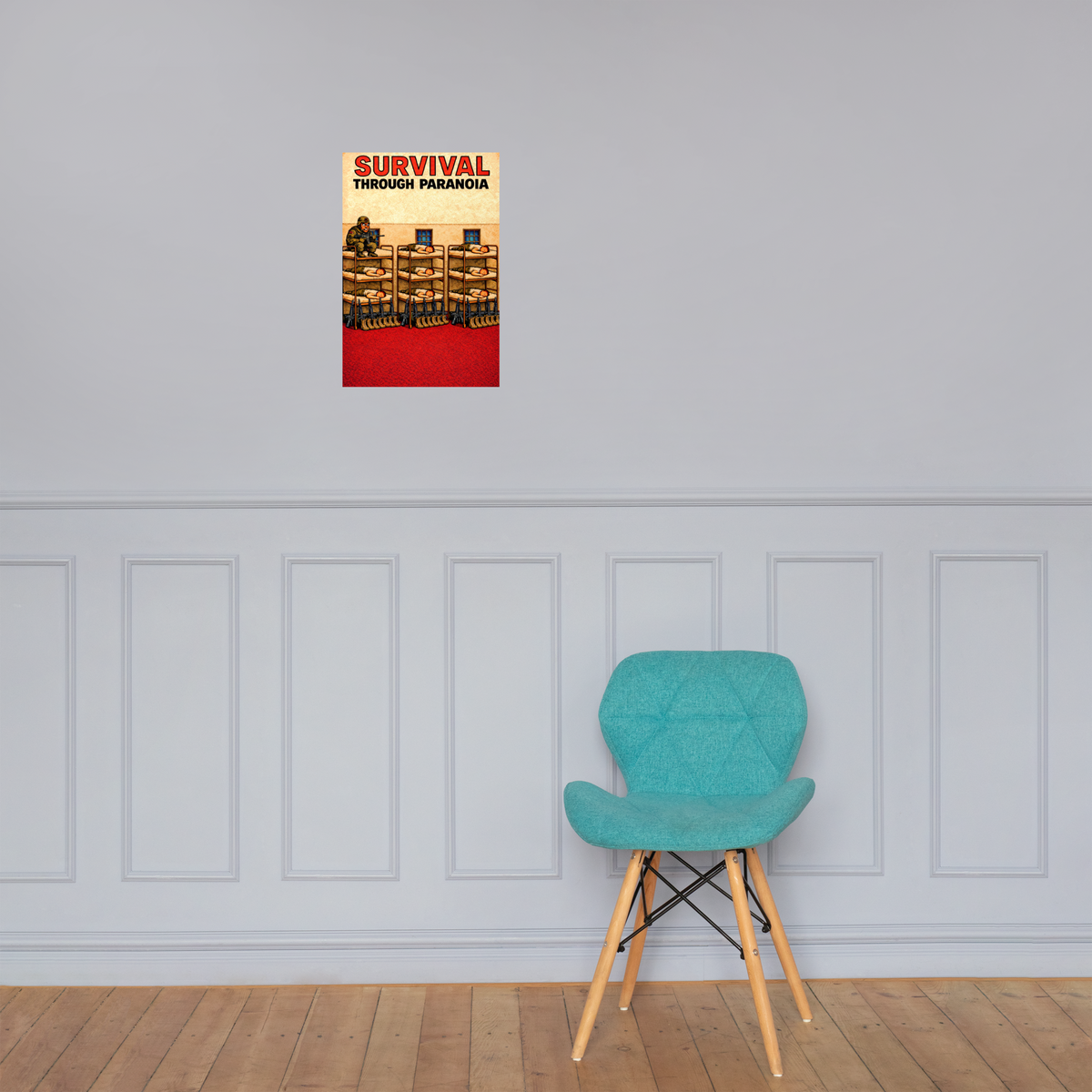 Survival Through Paranoia: 12 in by 18 in glossy poster on a paneled wall above a turquoise chair; Printful room mockup.