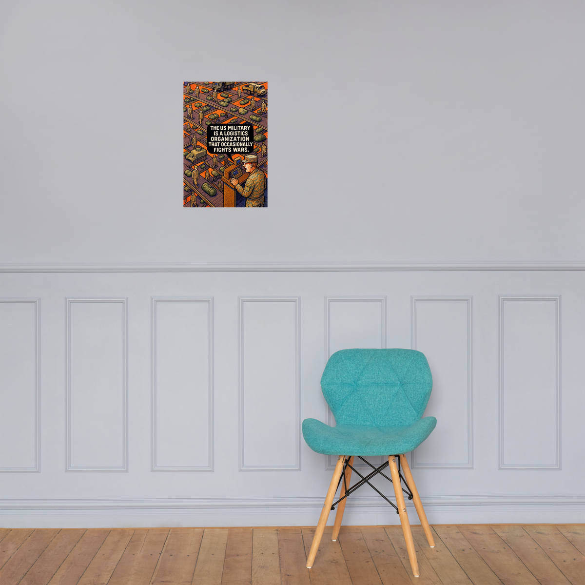 The US Military Is a Logistics Organization That Occasionally Fights Wars: 12 in by 18 in glossy poster on a paneled wall above a turquoise chair; Printful room mockup.